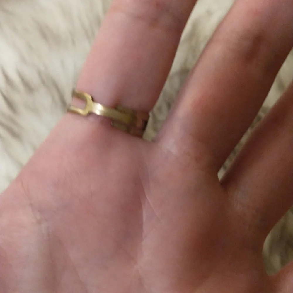 Super cute gold wire wrapped faux turquoise adjustable ring.